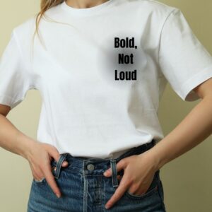 White women’s t-shirt with “Bold, Not Loud” text on the left – Teesora minimal statement tee.
